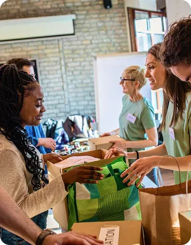 Volunteers packing donations for the community